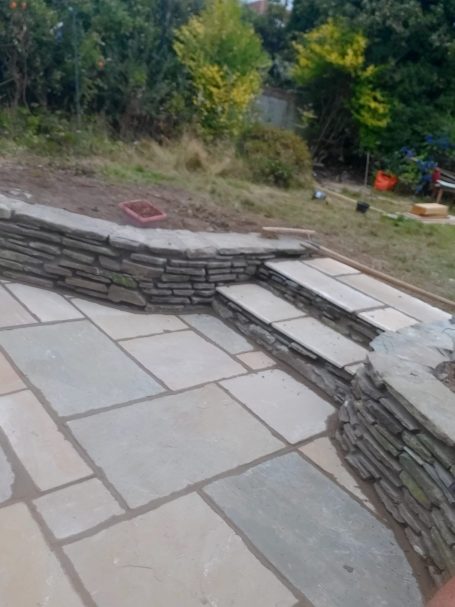 Sandstone patio, steps and retaining wall