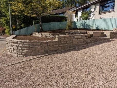 Stone wall, raised planting flower bed