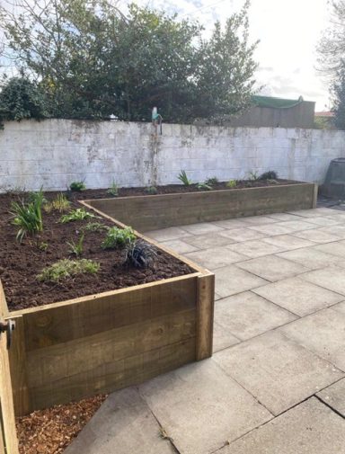 large L shaped timber raised bed